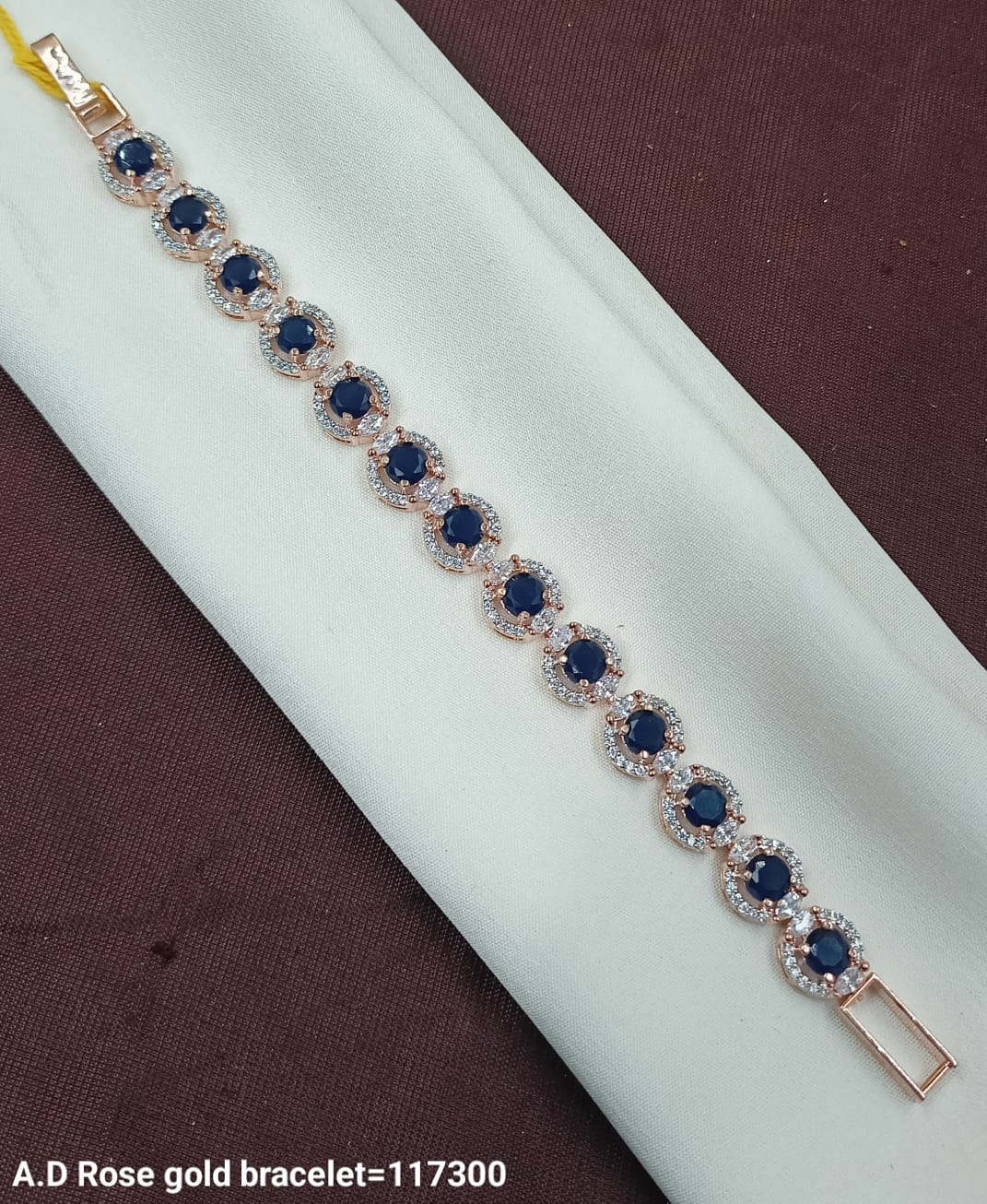 Luxury A.D Rose Gold Bracelet with Deep Blue Round Stones & Diamond Accents